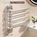 Rotating 4-bar towel rack in clear acrylic and silver with gold bow accents, 350mm high - Transparent 4-Bar with Gold Bow