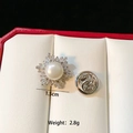 Detail view of 1.5cm shell butterfly brooch with pearls and crystals on a gift box - Large Pearl Brooch (C001)