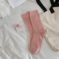 Pink ribbed cotton crew socks for women featuring classic vertical striped knit texture - One Size / Light Pink