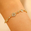 Elegant gold plated floral bracelet featuring crystal zircon stones on a woman wrist - 14k Light Gold Octagonal Floral Style (DZ-428)
