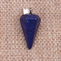 Macro view of blue faceted natural stone cone pendant with silver metal bail clasp - Lapis Lazuli