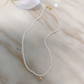 Natural pearl necklace with a golden smiley face pendant and adjustable chain - Glass Pearl Smile Face Necklace