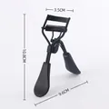 Matte black eyelash curler with comb teeth and ergonomic handle, size 10.8cm by 3.5cm - Electrophoretic Black With Comb