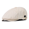 Detail view of the breathable beige newsboy cap featuring a textured fabric and metal buckle - Adjustable / Beige