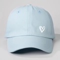 Close-up of a light blue cotton baseball cap featuring a white embroidered heart detail - One Size / Sky Blue