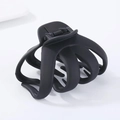 Pinza per capelli a polpo nera opaca dal design geometrico ovale su sfondo bianco - Nero