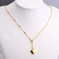 Elegante colgante de corazón dorado en una cadena fina minimalista para joyas mujer - Dorado