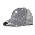 Detailed close-up of distressed brim on washed cotton baseball cap with mesh back - Adjustable / Daisy Gray