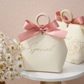 Elegant hexagonal wedding favor box with wooden ring handle and pink silk ribbon bow - Wooden Ring Handle / Beige European Style + Pink Ribbon