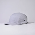 Detail of light grey 5-panel camper hat with metal eyelets and premium cotton texture - Light Gray