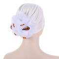 Detail view of large white floral applique with amber rhinestones on a turban headwrap - White