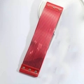 Detail of red pleated faux leather waist belt with silver metal snap button closure - Red