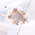 Close-up of elegant beige elastic hair tie with white pearls and gold-rimmed rhinestones - 3# Pearl Rhinestone Hair Tie