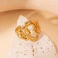 Detailed view of a gold chain design adjustable ring displayed on a stone pedestal - Geometric Chain/BJGR0139