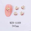 Macro detail of MZH-A169 star and moon nail charms with pink rhinestones for DIY nail art - Golden Moon Star Pink Rhinestone (A169)
