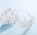 Elegant silver bridal headband with crystal leaves and hand-woven beaded details - Silver