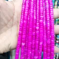 Close-up of polished rose red natural stone cylinder beads for DIY jewelry making - Rose Red Jade