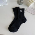 Elegant black ribbed mid-calf socks featuring delicate white bow embroidery details - One Size / Black