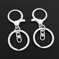 Detailed view of white painted lobster clasp with flat keyring DIY jewelry hardware - White (Painted)