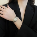 Artistic silver metallic nautical bangle featuring textured spiral seashell design - Nautilus Spiral Pattern (20#)