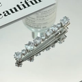 Silver bow hair clip with clear heart and square zircon stones on a mirror base - 3189 White Zircon-Silver + Clear Zirconia