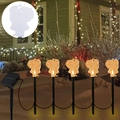 Outdoor Christmas solar stake lights featuring five warm white LED Santa Claus figures - Santa with Backpack Battery Box (5-in-1 Warm White)