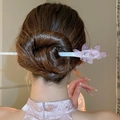 Pink butterfly hair pin with translucent resin wings in a refined bridal bun hairstyle - 163# Pink (Translucent Butterfly Style)