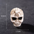 Miniature skull bead with spider detail for Halloween crafts, size 2.5cm by 1.7cm - Style 26 Spider Skull