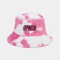 Detail of pink cow print faux fur bucket hat featuring a black #FOMO embroidered patch - Rose Red