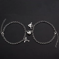 Silver Cuban link couple bracelets with magnetic heart and winged lock key charms - Heart Key Bracelet A