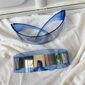 Detail of blue Y2K cat-eye sunglasses with silver mirror lenses and futuristic frame - One-piece Semicircle Blue Silver Mirror
