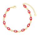 Detail of gold evil eye bracelet featuring red drip oil enamel and zircon accents - Red