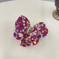 Elegant butterfly hair claw clip with colorful terrazzo pattern and rhinestone accents - Gemstone Red Purple Terrazzo Butterfly