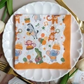 Cartoon animal party paper napkins with giraffe and zebra prints on a lace plate - Animal Party (1098)