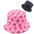 Detail showing the reversible design of the wide brim sun hat with leaf pattern print - Red