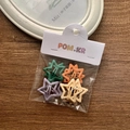 Star-shaped matte acetate hair clips set in various colors on wooden background - Pentagram / 10 Pieces Pack / Four-Color Style