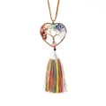 Detailed close-up of handmade tree of life heart pendant with seven chakra stones and tassel - Seven Chakra
