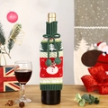 Christmas wine bottle cover with knit snowman and tree pattern and green pom-pom drawstring - Snowman