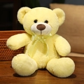 Classic yellow teddy bear plush toy with matching ribbon bow on a wooden surface - 35cm / Lemon Yellow