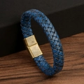 Blue woven leather bracelet with brass magnetic clasp on dark wooden background - Retro Lake Blue + Antique Bronze