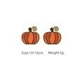 Close-up of cute cartoon orange pumpkin earrings with size 13x13mm and weight 2g - Pumpkin Style (A244)