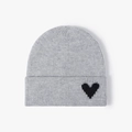 Light grey knit beanie with black heart pattern and folded cuff for women - One Size / Light Gray