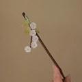 Handcrafted dark brown bamboo hair pin featuring elegant white flowers and green leaves - Classic White Flower (S412)