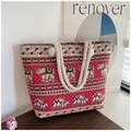 Detailed close-up of a red ethnic canvas tote bag with elephant pattern and rope handle - Red Ethnic Elephant