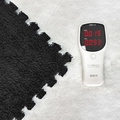 Interlocking black and white plush floor mats with soft texture for bedroom decor - Black