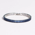 Women's silver tennis bracelet featuring emerald-cut blue zircons with a secure fold-over clasp - Silver Blue Zircon