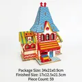 3D wooden puzzle model of Deja Vue Florist shop with blue roof and 59 assembly pieces - Flower Shop / 59 Pcs/Finished 17x12.5x21.5cm
