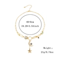 Collier pièce céleste doré avec pierres bleues et vertes sur une chaîne trombone - Collier Trombone Étoile Lune / Or