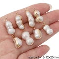 Irregular white baroque pearls with golden pendant clips held in hand for sizing - #08 Pea Pod (9x18-12x25mm) / 1pc/pack