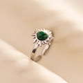 Close-up of adjustable silver steel ring with sunburst malachite stone setting - Silver-Green Malachite